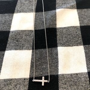 Silver tone and gemstone sideways cross necklace